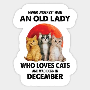 Never Underestimate An Old Lady Who Loves Cats And Was Born In December Sticker